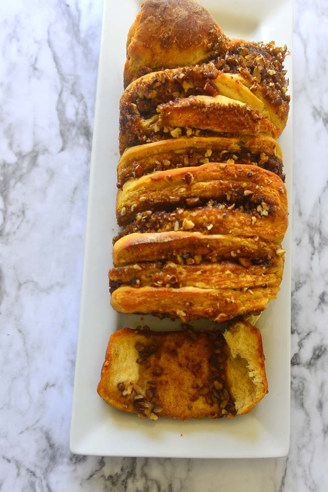 Pull Apart Bread on a white platter showing the filling.