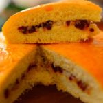 Pinnable image showing a cross section of dilkush.Dilkhush/Dilpasanad - Coconut Buns