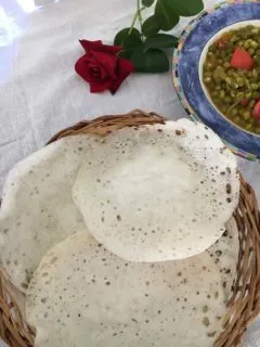 Palappam , the lacy pancakes from Kerala made with fermented rice batter