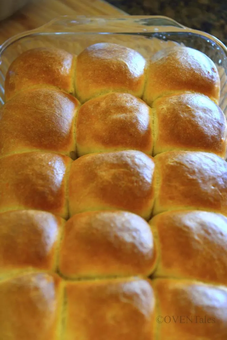 Fresh baked pav rolls in the baking pan.