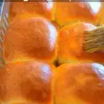 Image for pinning - brushing melted butter over the fresh baked pav buns.