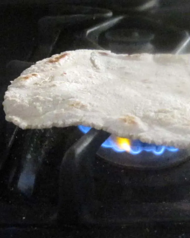Jowar Roti cooking on open flame 