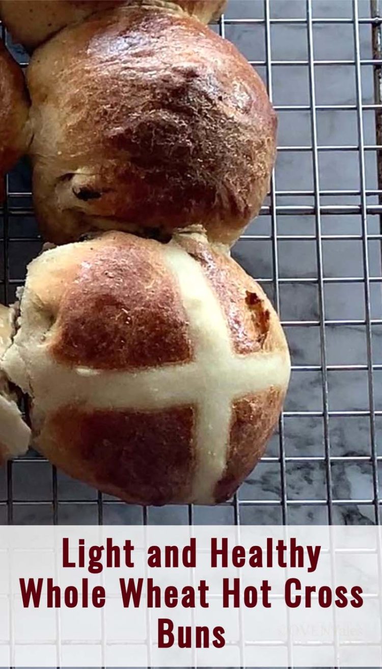 Hot Cross buns on a cooling rack. Image with caption "Light and healthy hot cross Buns"