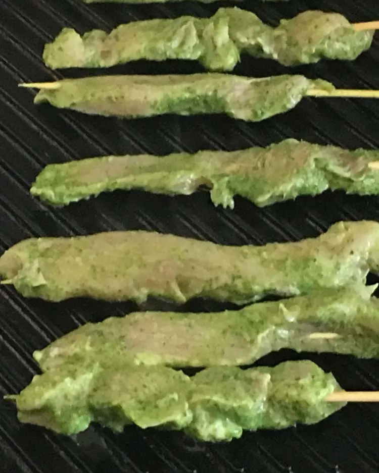 tender chicken skewers marinated in cilatro and lime marinade and grilled 