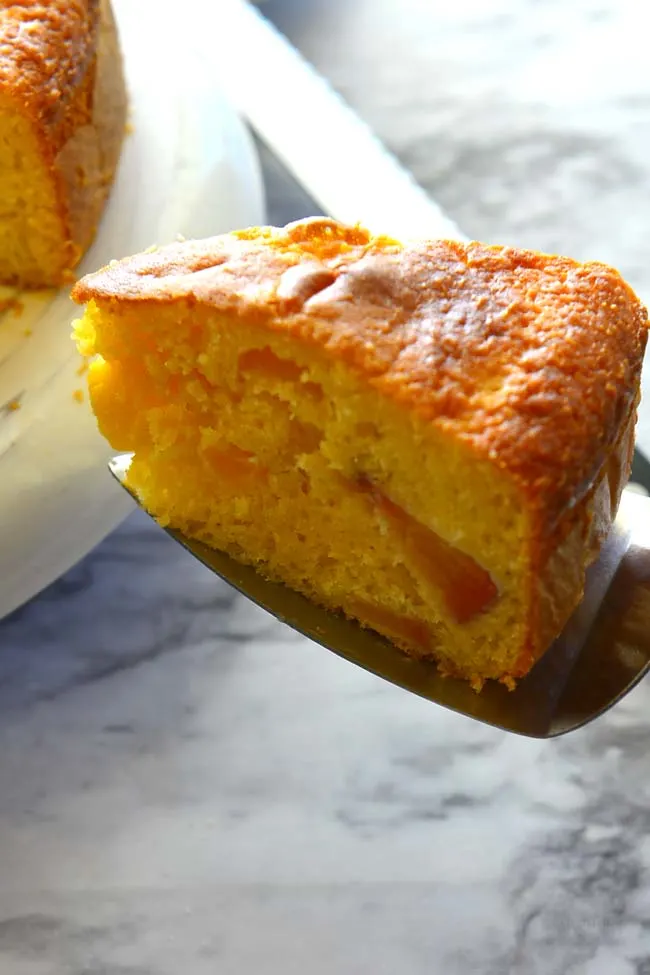Slice of fresh Peach cake made with boxed cake mix
