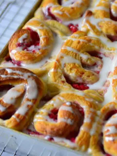 Raspberry Swirl Sweet Rolls in a baking pan