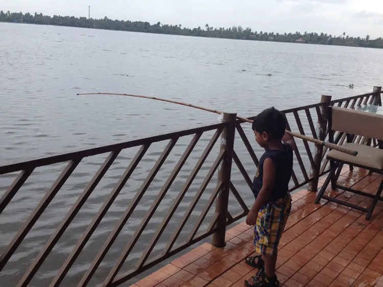 Fishing from the porch in Kuttanad 