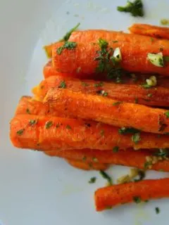 Roast Carrots on a white background