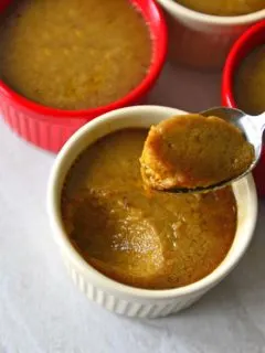 Wattalappam in ramekins. A scoop of wattalappam in a spoon.