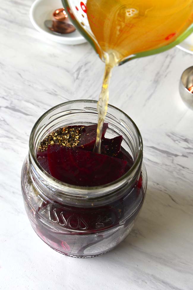 Pickled Beets - Pour the pickling liquid over the beets