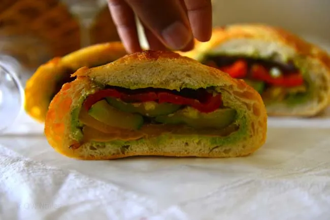 A delicious  pressed  sandwich with  grilled  vegetables  and  a crusty loaf 