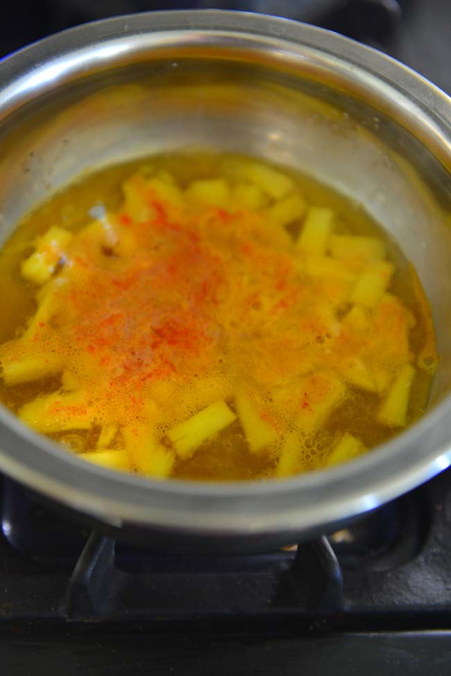 Cooking pineapple for pachadi 