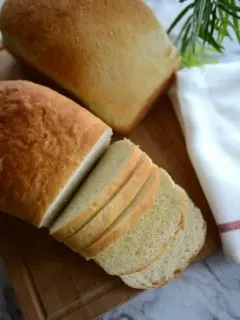 Herman Milk Bread Loaves- One Sliced to show texture.