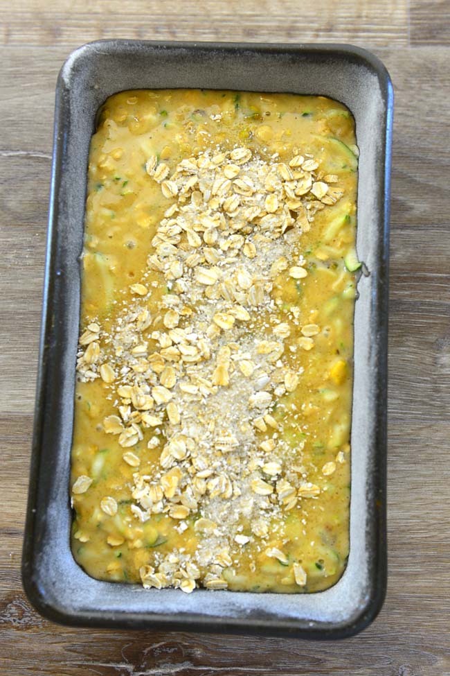 Zucchini bread batter poured in the prepared pan and ready for the oven