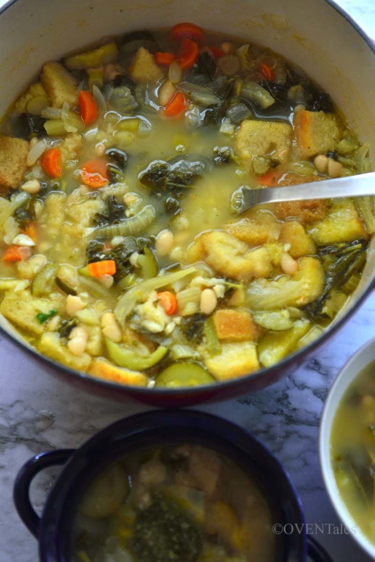 Soup pot with ribollita and a ladle in it