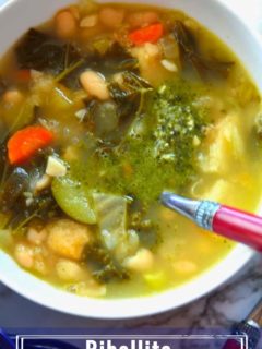 Ribollita in a white bowl with a red spoon
